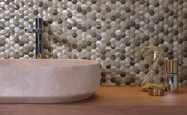 Porcelanosa mosaic tiles adding texture to a modern shower wall.