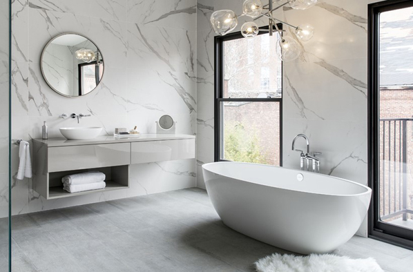 Coordinated baths and basins deliver a seamless Victoria + Albert design.